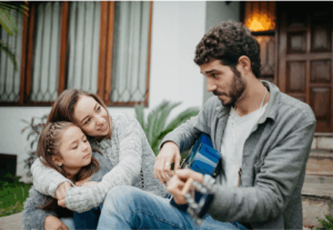 A family enjoying music outdoors. How Minus Bite Natural Bug Spray Can Keep Your Family Safe